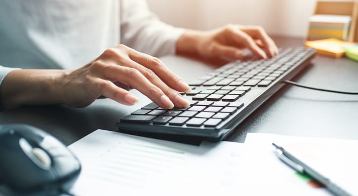 e-learning. typing on a keyboard